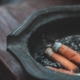 three cigarette butts on ashtray