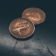 two round gold-colored coins