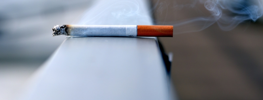 white cigarette stick on white wall