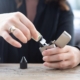 person holding silver flip lighter